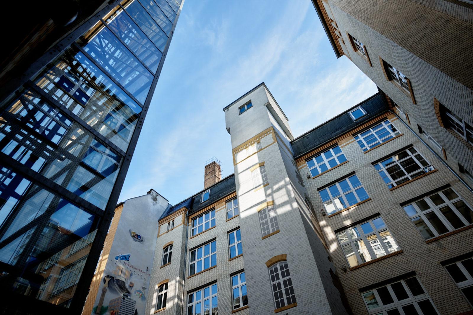 the studio is located in an industrial backyard
